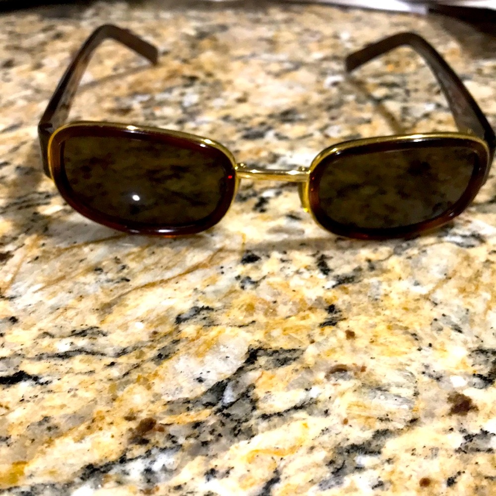 Vintage brown and gold Police frames by occhali